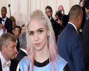 Grimes says she has COVID-19