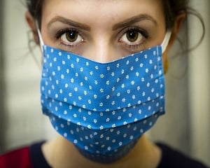 Humidity from masks may help lessen severity of coronavirus infection, say scientists
