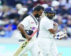India live to fight another day