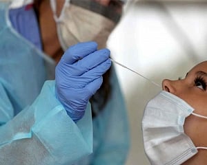 India logs 25,467 new COVID-19 cases