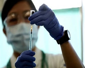 Japan opens mass vaccination centres 2 months before Games