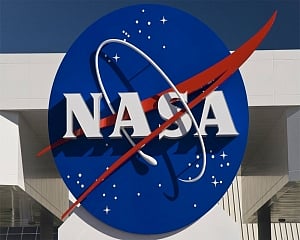 NASA spacecraft begins 2-year trip home with asteroid rubble