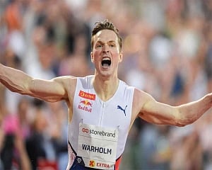 Norway's Karsten Warholm breaks 400 hurdles world record