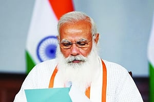 Work out strategy to save rural India from Covid, PM tells DMs