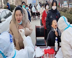 China's daily Covid cases hit two-year high; reports nearly 2,000 new infections