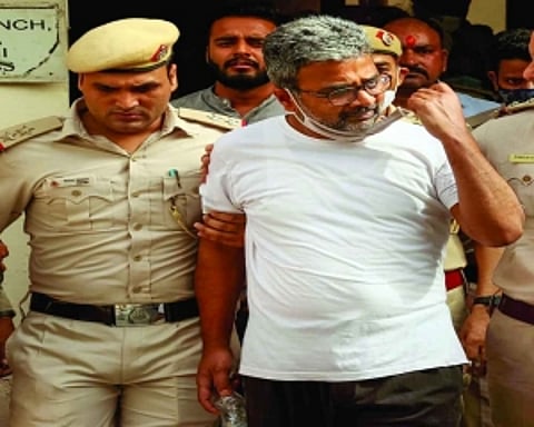 DU Professor held for shivling post gets bail