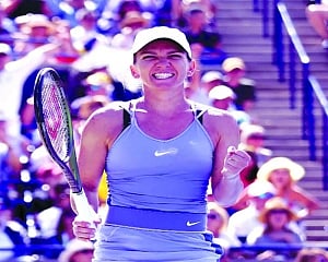 Halep completes hat-trick