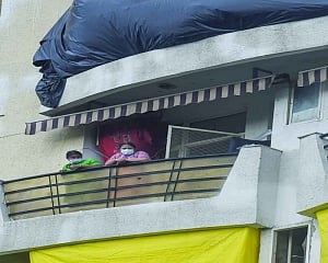 Hours after towers razed, people return