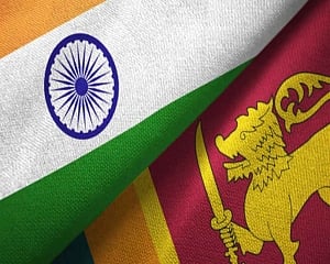 India hopes for early solution to Lanka crisis through democratic means; says continue to stand with people there