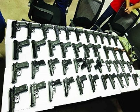 Indian couple held with 45 guns at IGIA