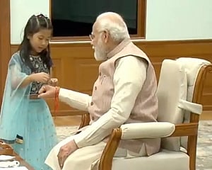 Modi celebrates Raksha Bandhan with daughters of PMO staff members