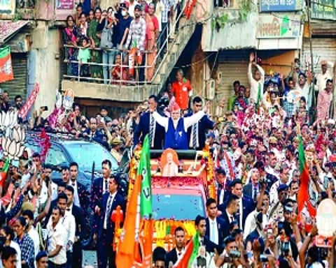 Modi raises Gujarat poll pitch with 50-km show