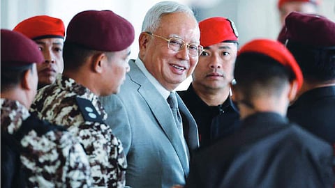 Ex-Malaysian PM convicted in trial over 1MDB corruption scandal