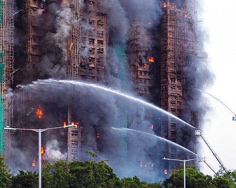 Fire rages in Hong Kong, high-rise, 13 killed
