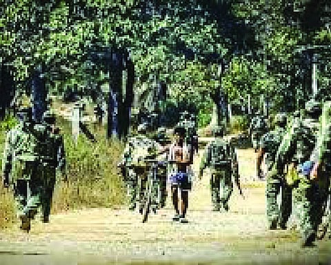 Naxalite, wanted in 35 cases, surrenders in Jharkhand