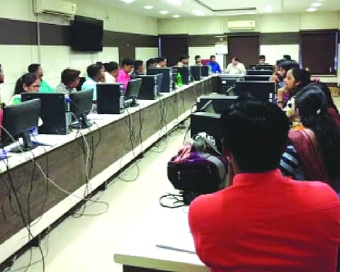 Warrant issued against 2 men accused of being part of call centre scam