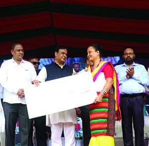 Assam CM presents cheques worth `32 crore to 31,910 women entrepreneurs