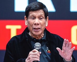 Former Philippine president faces crime-against-humanity charges