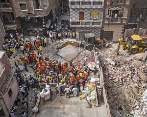 Four dead, several feared trapped after four-storey building collapses in northeast Delhi