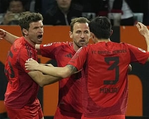Kane scores in Bayern win over Augsburg as march towards Bundesliga title continues