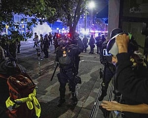 LA police swiftly enforce downtown curfew as protests against Trump's immigration crackdown continue