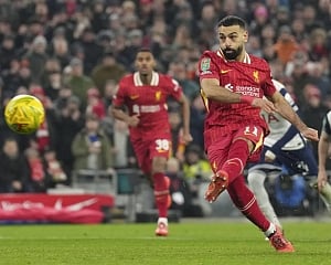 Liverpool routs Tottenham 4-0 to set up English League Cup final against Newcastle
