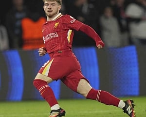 Liverpool stuns PSG with late winner in Champions League and 10-man Barcelona beats Benfica
