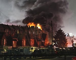 Plane with 6 aboard crashes in Philadelphia, setting homes ablaze, unleashing fireball