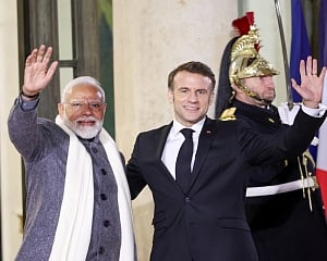 PM Modi greeted by ‘friend' Macron in France