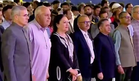 Chief Minister Omar Abdullah and others stand during the rendition of Vande Mataram at the International Film Festival in Srinagar. Image source: X/screengrab (Kashir live)