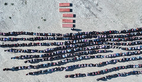 A Syrian man buries his wife and 4 children killed in Israeli strikes on Beirut