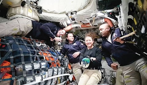 Artemis II astronauts rocket toward moon after spending day around Earth