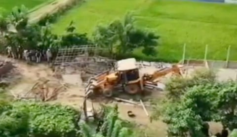 An eviction drive underway in Assam’s Goalpara district. Image source: X/Screengrab (Assam Tribune)