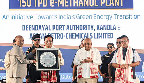 Union Ports Minister Sarbananda Sonowal is presented a memento as Gujarat CM Bhupendra Patel and Assam CM Himanta Biswa Sarma look on at the e-methanol plant foundation ceremony in Kutch on Sept. 26, 2026. (PTI Photo)