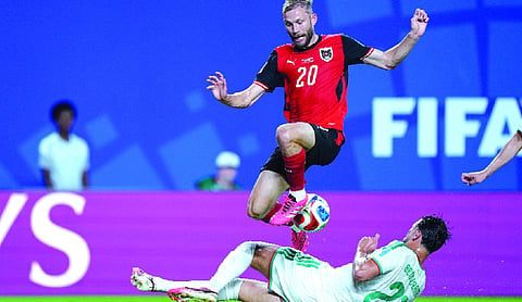Austria, Algeria both advance at World Cup with stunning 3-3 draw