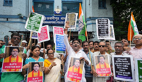 Congress activists stage a protest outside Bhowanipur Police Station against Bageshwar Dham chief Dhirendra Krishna Shastri for his alleged remarks against the sentiment of Bengal for the upcoming Durga Puja festival, in Kolkata, West Bengal, Tuesday. PTI
