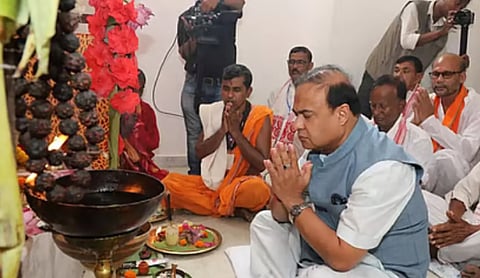 Assam Chief Minister Himanta Biswa Sarma performs a puja. (Image: Facebook/@HimantaBiswaSarma)