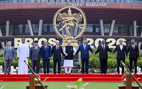 BRICS leaders pose for a group photograph during the summit at Bharat Mandapam in New Delhi. PMO via PTI Photo.