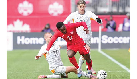 Canada battles back to tie Iceland 2-2