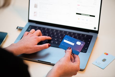 Representational image of online shopping using a bank card. Photo: Bogdan Hoyaux / European Commission / Wikimedia Commons (CC BY 4.0).