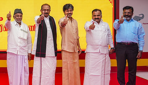 Tamil Nadu Chief Minister C Joseph Vijay with leaders of the TVK-led alliance. PTI image