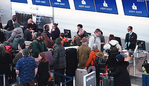 Flight cancellations after US storms dump snow
