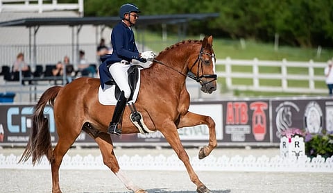 File photo: A rider on a horse during a dressage competition, NAGOYA. (PTI Photo)