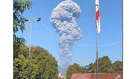 Indonesian rescuers find one body after volcano eruption as search continues