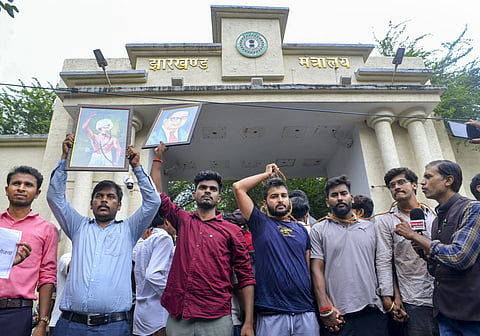 Protesters during a demonstration in Jharkhand over the recruitment examination row. | Image Source: PTI