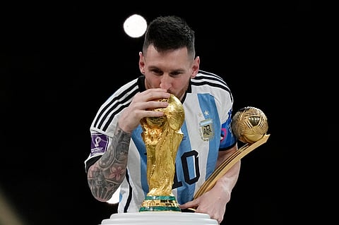 File photo: Argentina's Lionel Messi kisses the trophy after winning the 2022 World Cup final in Lusail, Qatar. (AP Photo via PTI)