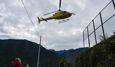 Nepal army officials transport fuel containers and relief material during a rescue operation after the devastating flash floods, in Trishuli, Nepal, Tuesday, Sept. 1, 2026. PTI photo