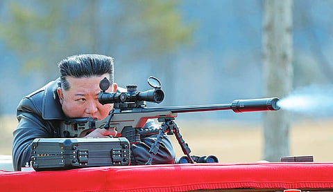 North Korea’s Kim gifts rifles to officials and his daughter takes aim after party congress
