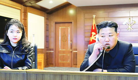 North Korean leader Kim watches cruise missile tests with daughter
