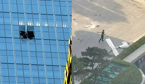 Pilot killed, 13 injured after small plane crashes into high-rise building in Beijing